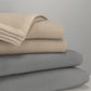 coperta lana somma beige e grigia ripiegate